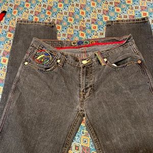 Coogi low rise vintage jeans. They’re embroidered and beautiful pair of pants